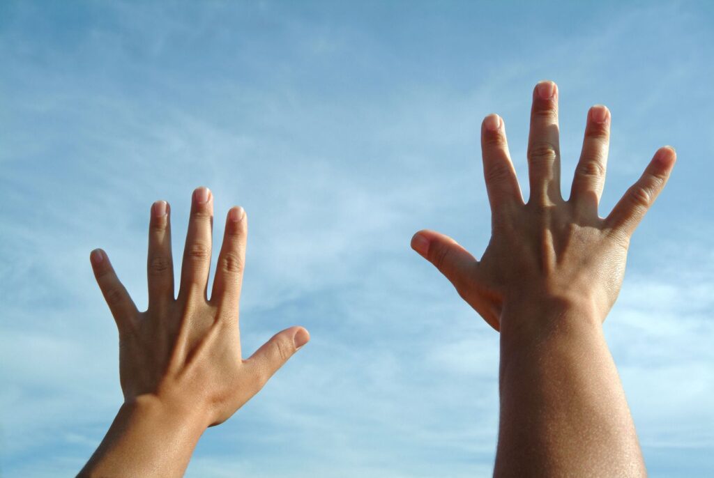 Hands reaching to the sky for faith and inspiration