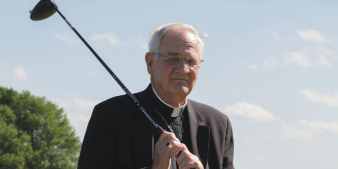 Priest with golf club