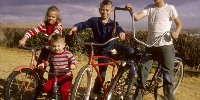 4 kids from the 1960s with their bikes