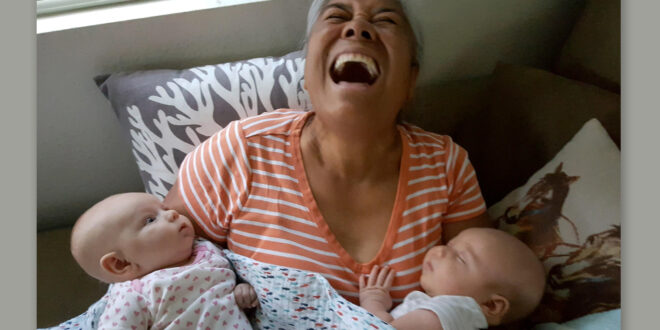 Happy Lady with 2 babies