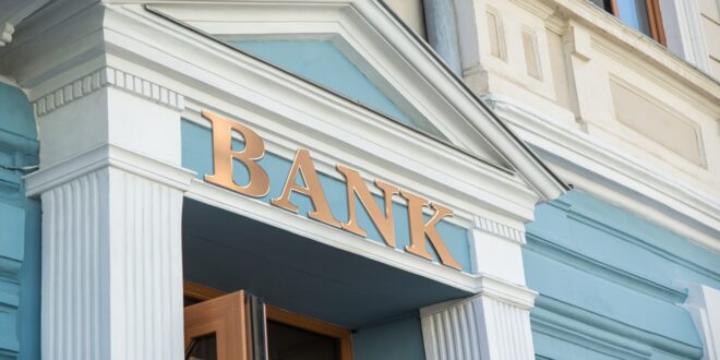 Bank sign on blue building