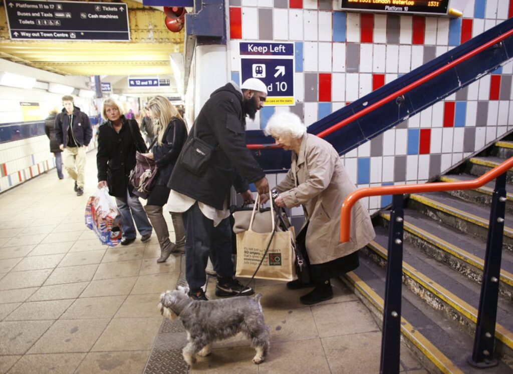 man helping elderly woman