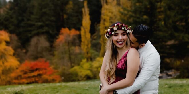 couple hugging in fall setting