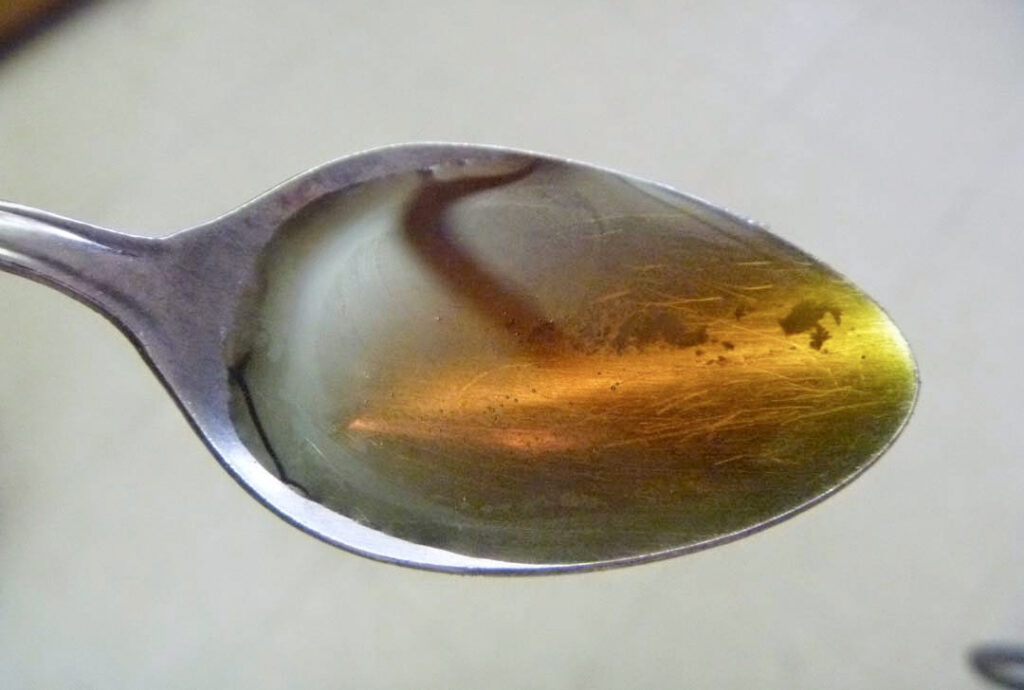 oil on a spoon