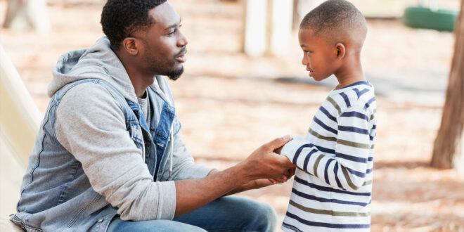 man talking with a child