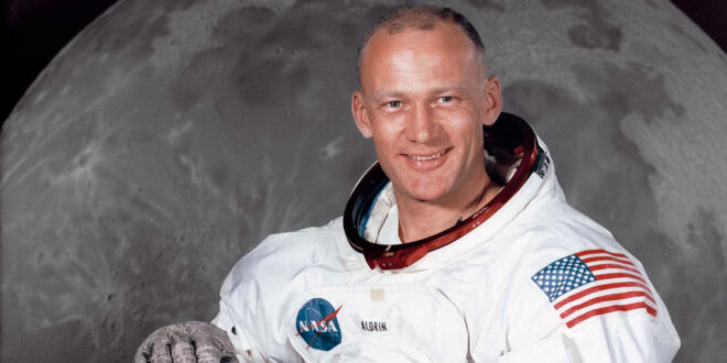 Buzz Aldrin in front of moon