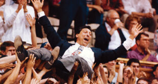 Jim Valvano being carried off the court after winning