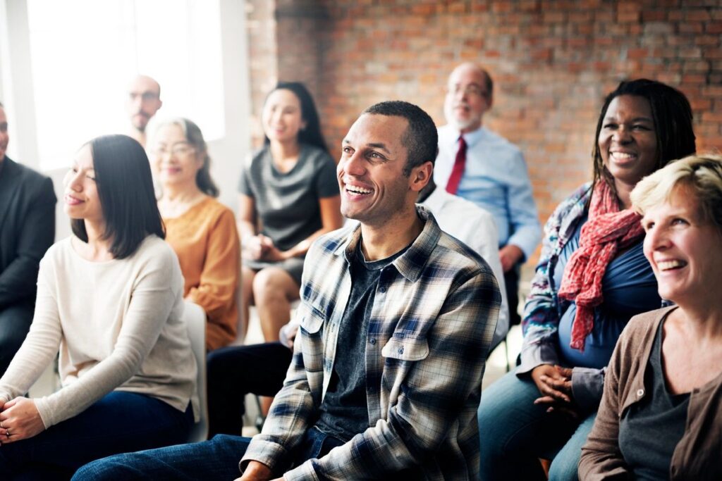 Adults laughing and learning