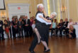 elderly couple doing ballroom dancing