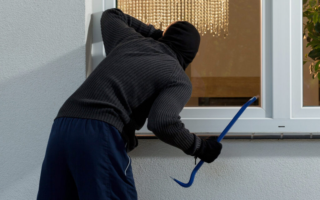 burglar at house window