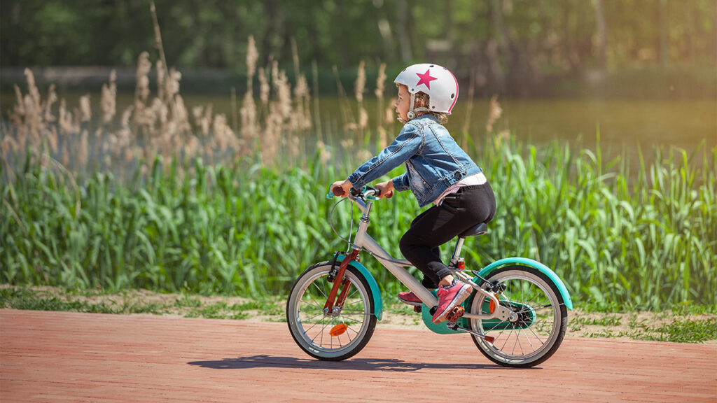 little girl on her bike