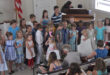 children singing in church