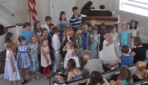 children singing in church